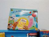 a box of assorted toys sitting on a table