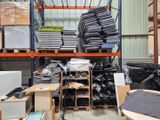 a large amount of items in the warehouse on the shelves