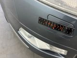 a close up of a car that has a sticker on the front of it