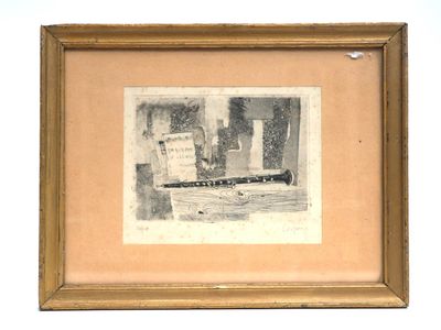 framed photograph of a cat sitting on a window sill next to a window
