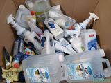 a cardboard box full of cleaning products and cleaning products
