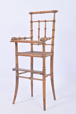 a wooden high chair with a wooden seat on a white background