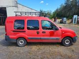 a red van parked in front of a building