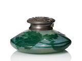 an image of a green and white vase with a silver lid