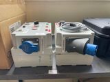 two machines that are sitting on a table