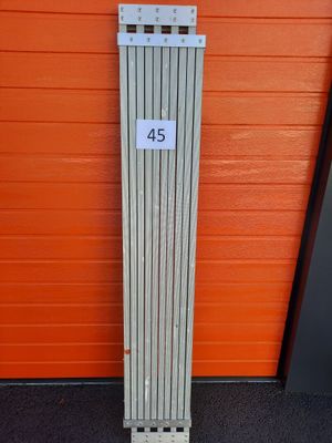 a close up of a metal radiator with a number on it