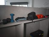a shelf that has a bunch of different items on it