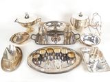 a lot of silver items that are on the table