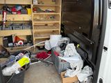 a white van that has a lot of stuff inside of it