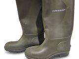 pair of green rubber boots on a white background