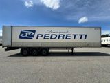 a semi truck that is parked in a parking lot