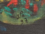 a close up of a painting of flowers on a black background