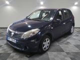 a picture of a small blue car parked in a garage