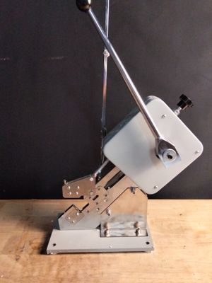a machine that is sitting on top of a wooden table