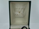 a box with a ring inside of it on a table