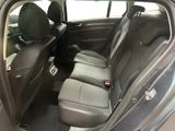 the back seats of a car are empty with no one in it