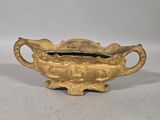 antique brass planter with handles and handles on a white background