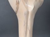 marble sculpture of a woman ' s head on a marble base