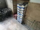 a lot of boxes of pizza sitting on the floor