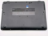 a close up of a laptop with a battery on it
