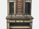 an image of a very old wooden cabinet with drawers