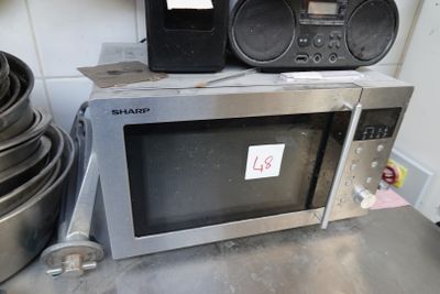 a microwave that is sitting on top of a counter