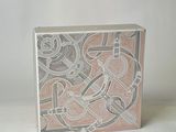 a picture of a small box with a design on it