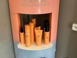 a display with a lot of hair products on it