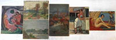 de nombreux tableaux accrochés au mur d'une pièce