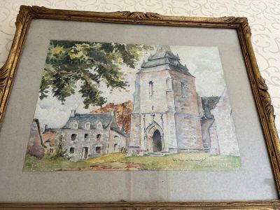 tableau encadré représentant une église avec un arbre devant