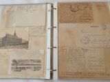 an old book with a lot of old papers on it