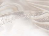 a close up picture of a clear bottle with a label on it