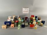 a lot of different types of perfumes on the table