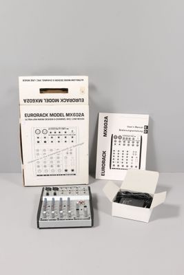 a box with a calculator and a calculator in it