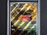 a close up of a pokemon card on a table