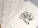 a lot of papers that are sitting on a table