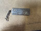 a keychain that has been placed on the floor