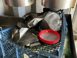 many pots and pans that are sitting in a container
