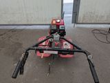 an image of a tractor with a small engine