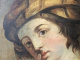painting of a woman in a turban with a finger on her lips