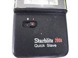 a close up of a flash camera on a table