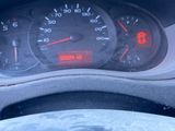 a close up of a car dashboard with a speedometer