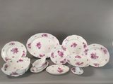 an image of a bunch of plates and bowls on a table