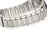 a close up of a watch on a silver bracelet