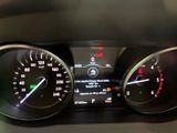 an image of a car dashboard with a speedometer and other gauges