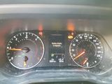 a close up of the dashboard of a car with the gauges on