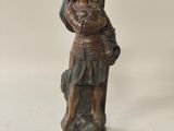 an image of a statue of a woman holding a baby