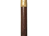 a close up of a wooden stick with a metal handle