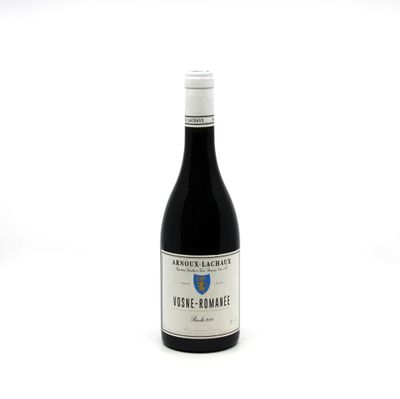 a bottle of wine that is sitting on a table
