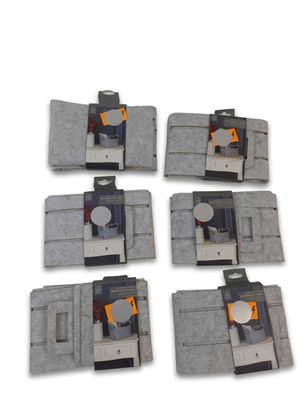 six morceaux de feutre gris, chacun orné de boutons orange et noirs